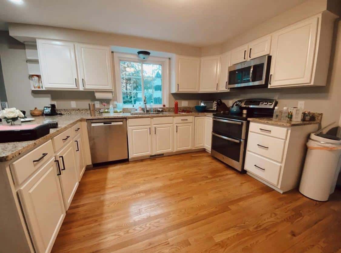 Kitchen after: cabinets painted white