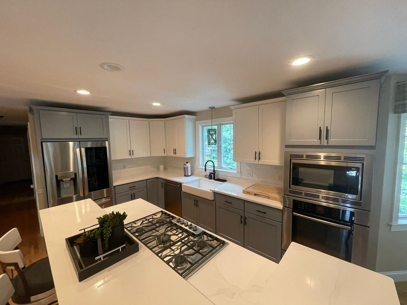 White shaker kitchen after cabinet refinishing