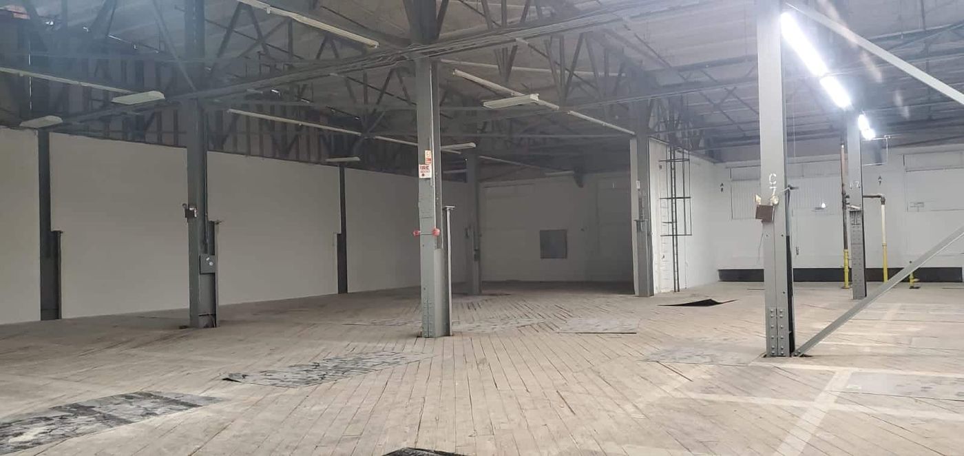 Commercial warehouse interior painted white